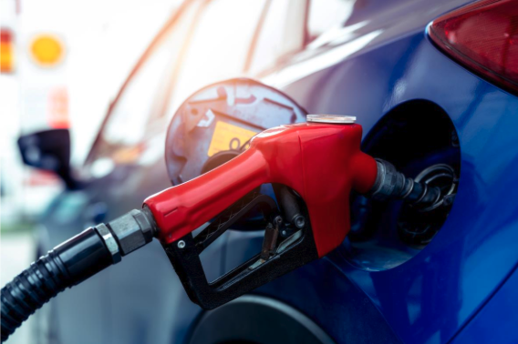 Image of gas pump nozzle in a car